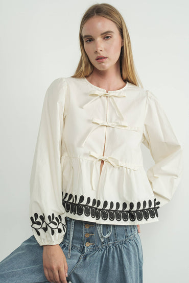 Embroidered Bow Tie Peplum Top