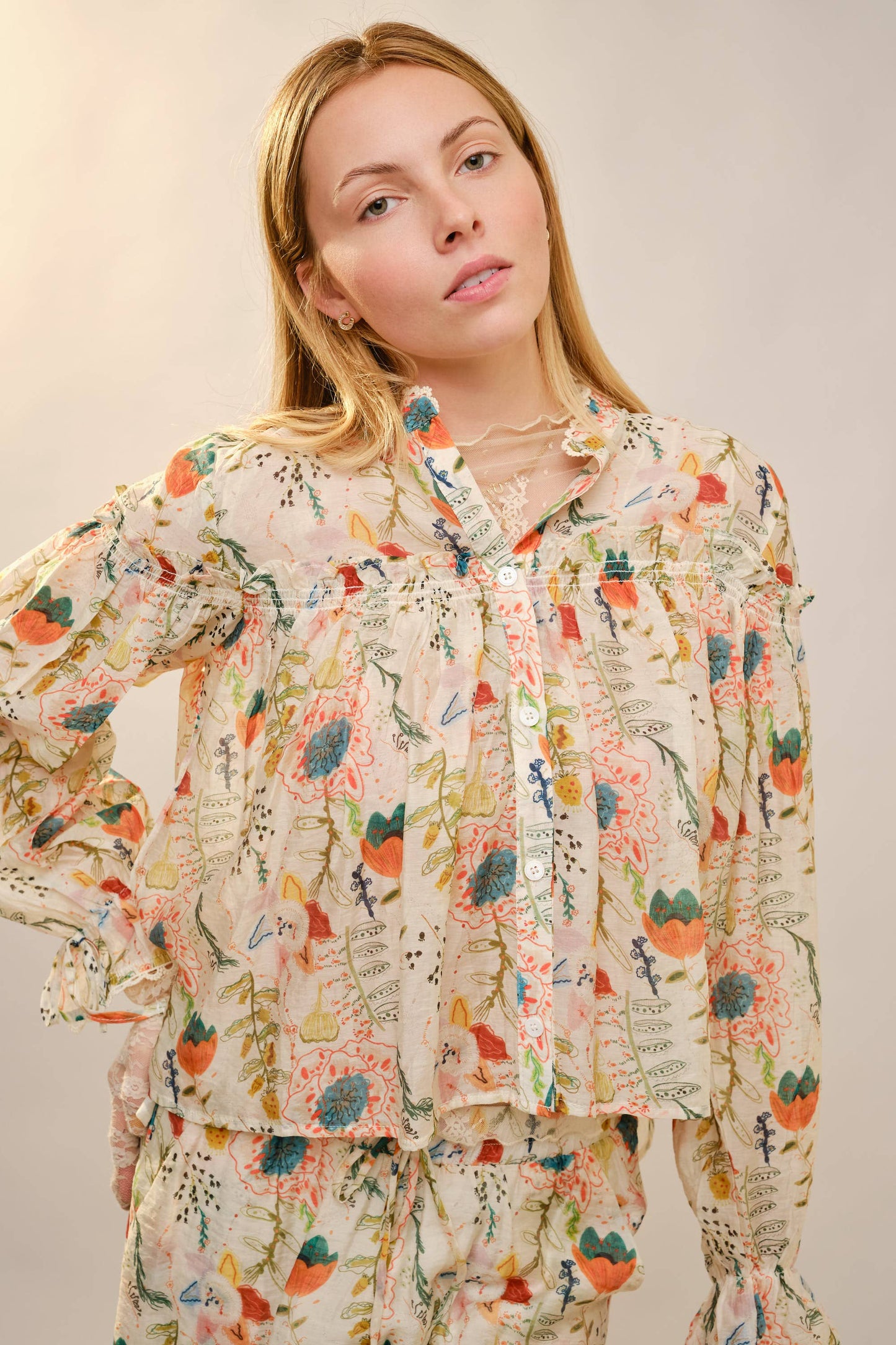 Mock Neck Ruffle Yoke Balloon Sleeve Top
