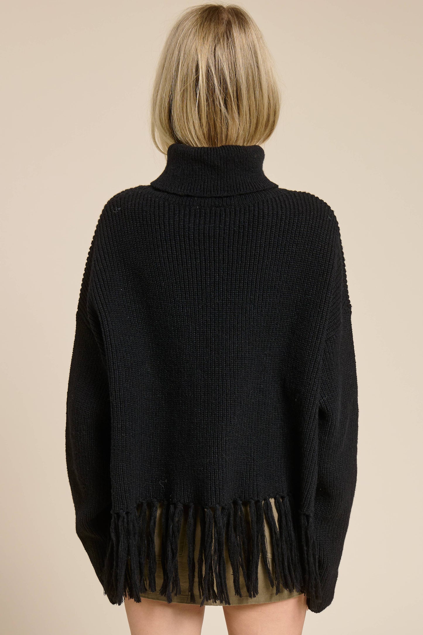 Fringe Hem Ribbed Turtleneck Sweater