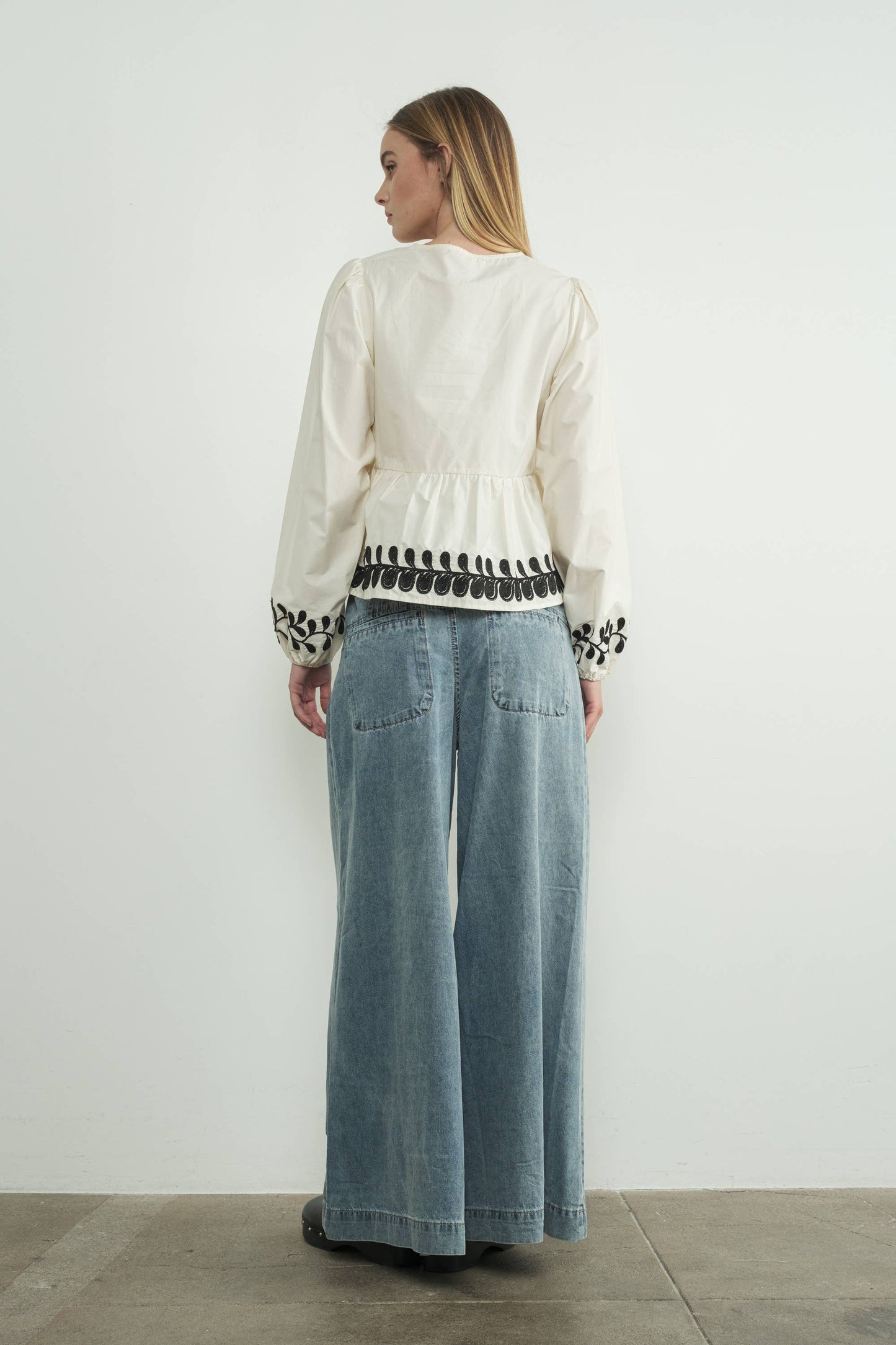 Embroidered Bow Tie Peplum Top