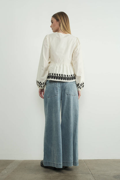 Embroidered Bow Tie Peplum Top