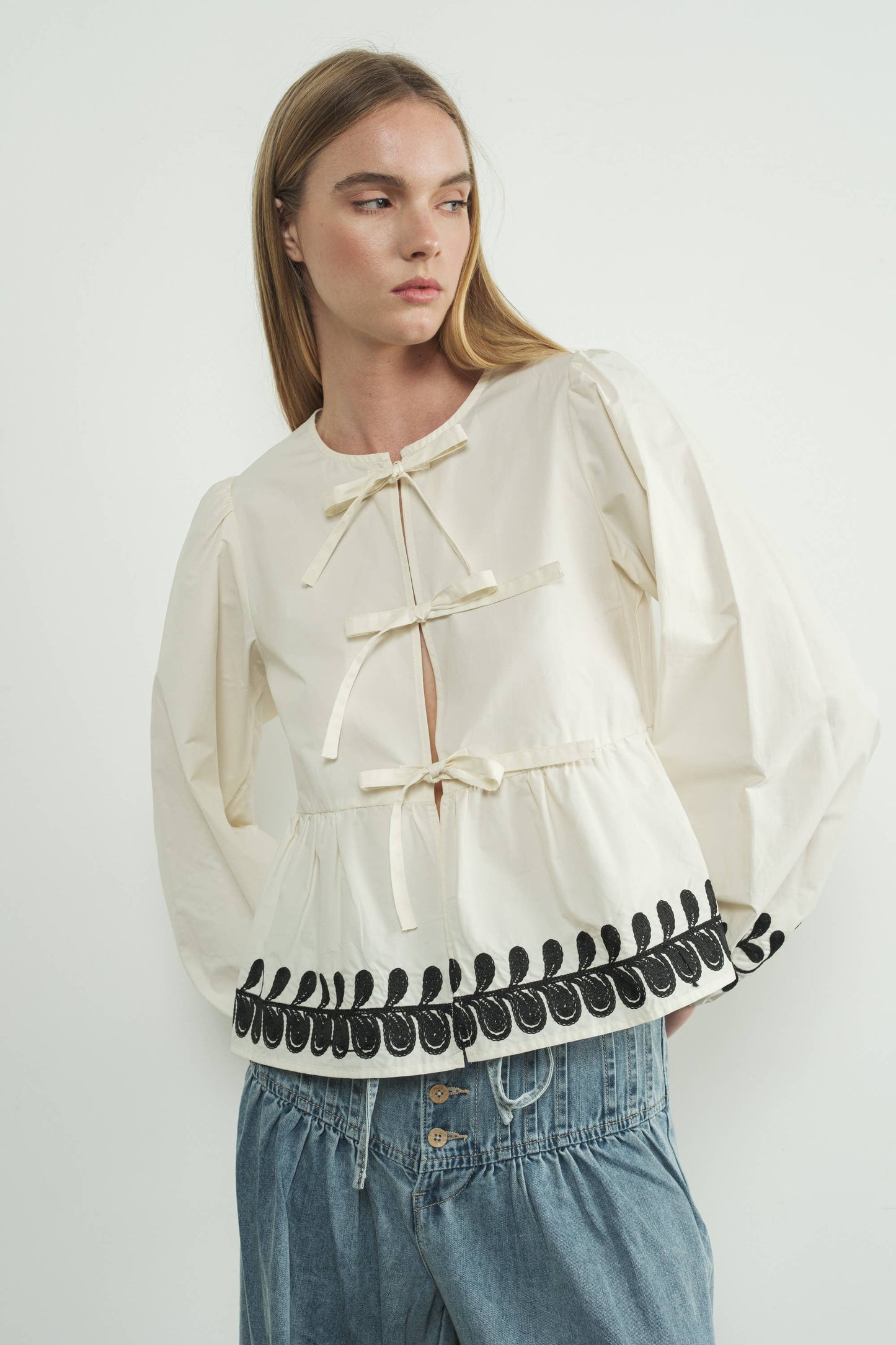 Embroidered Bow Tie Peplum Top