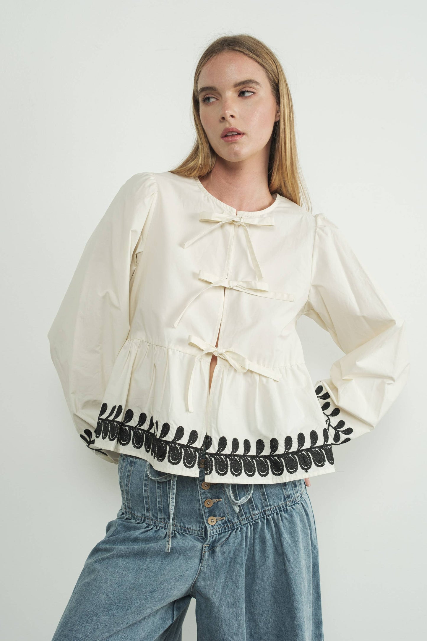 Embroidered Bow Tie Peplum Top